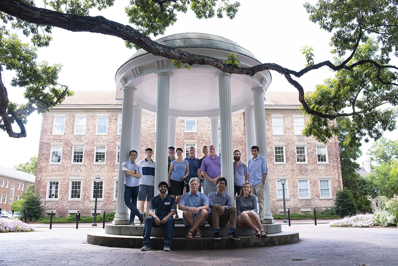 Group shot of all the researchers involved in the project, in front of the Old Well.
