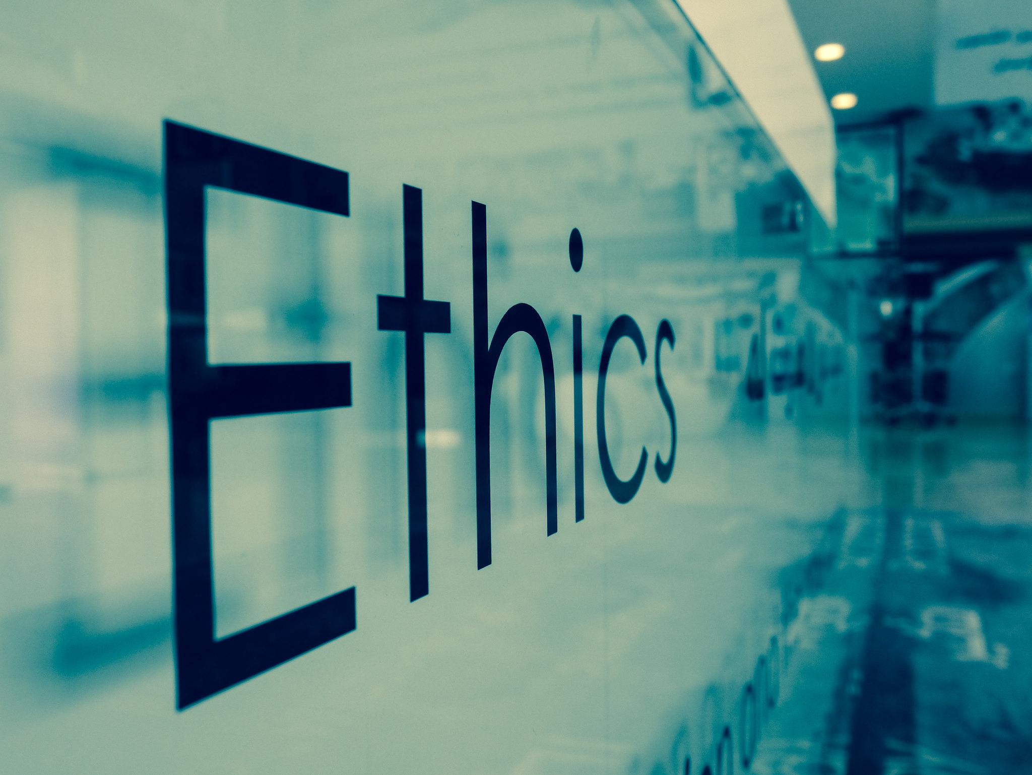 Image of the word "Ethics" written on glass.