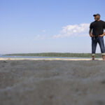 Photo of Brent Harrison on the beach.